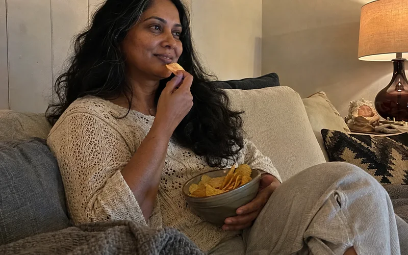 Customer enjoying Salted Caramel chips at home